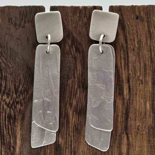 Textured Wind Letter Earrings