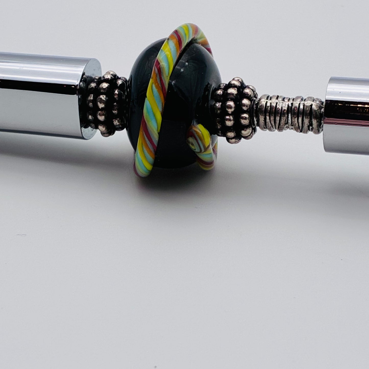 58 - Red & Yellow Twisty Wrap Bottle Opener