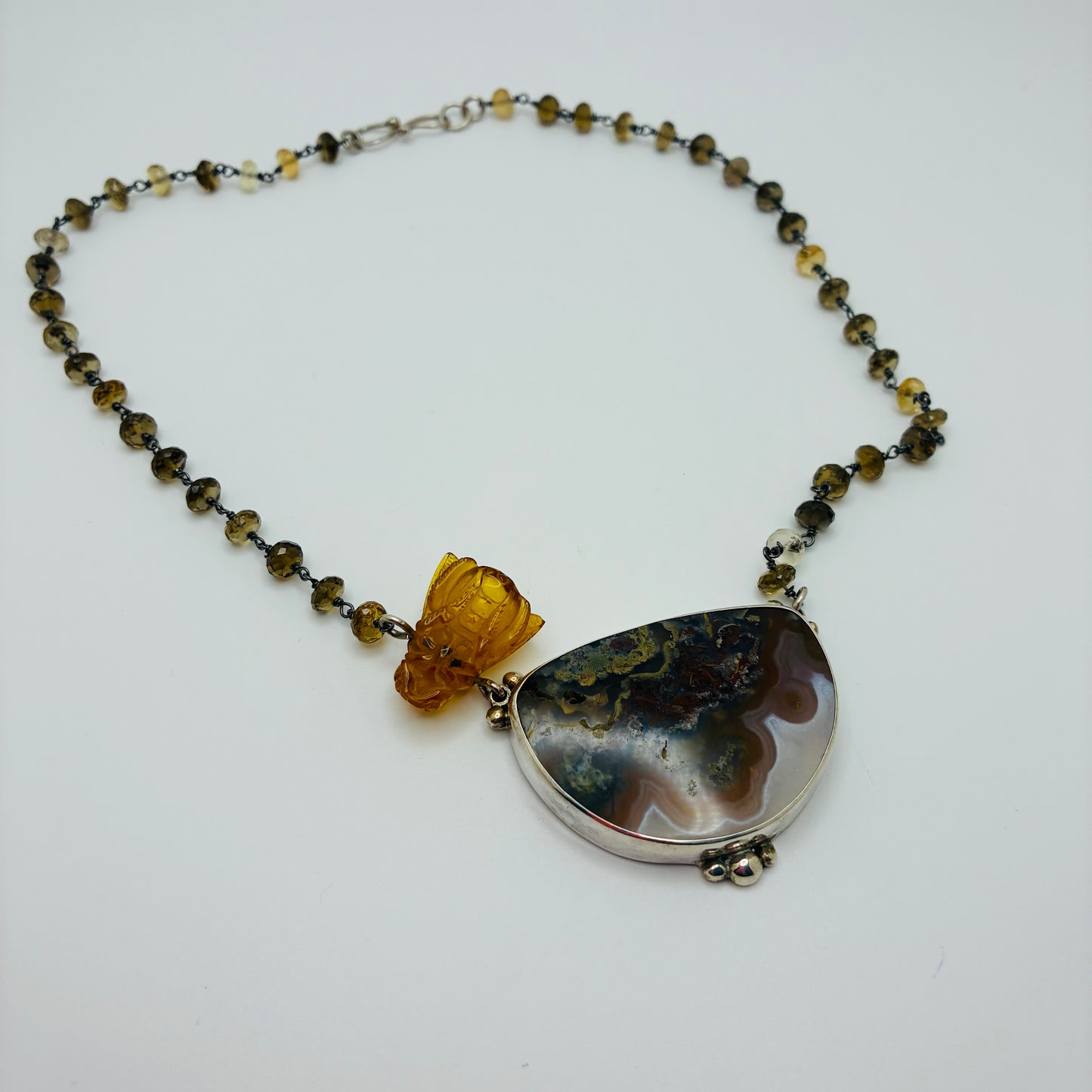 Amber Bee Necklace Hand Carved in Bali